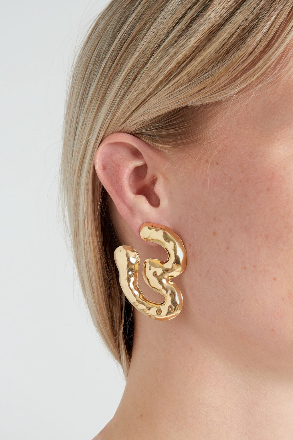 Chunky melting oorbellen goud