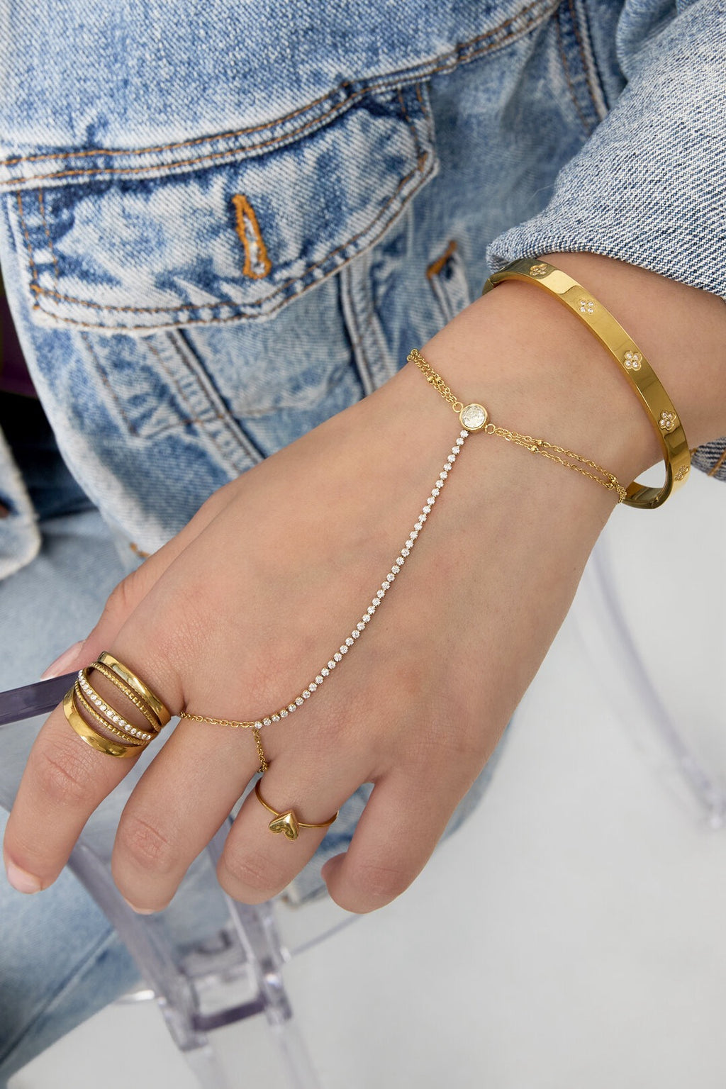 Handchain steentjes goud