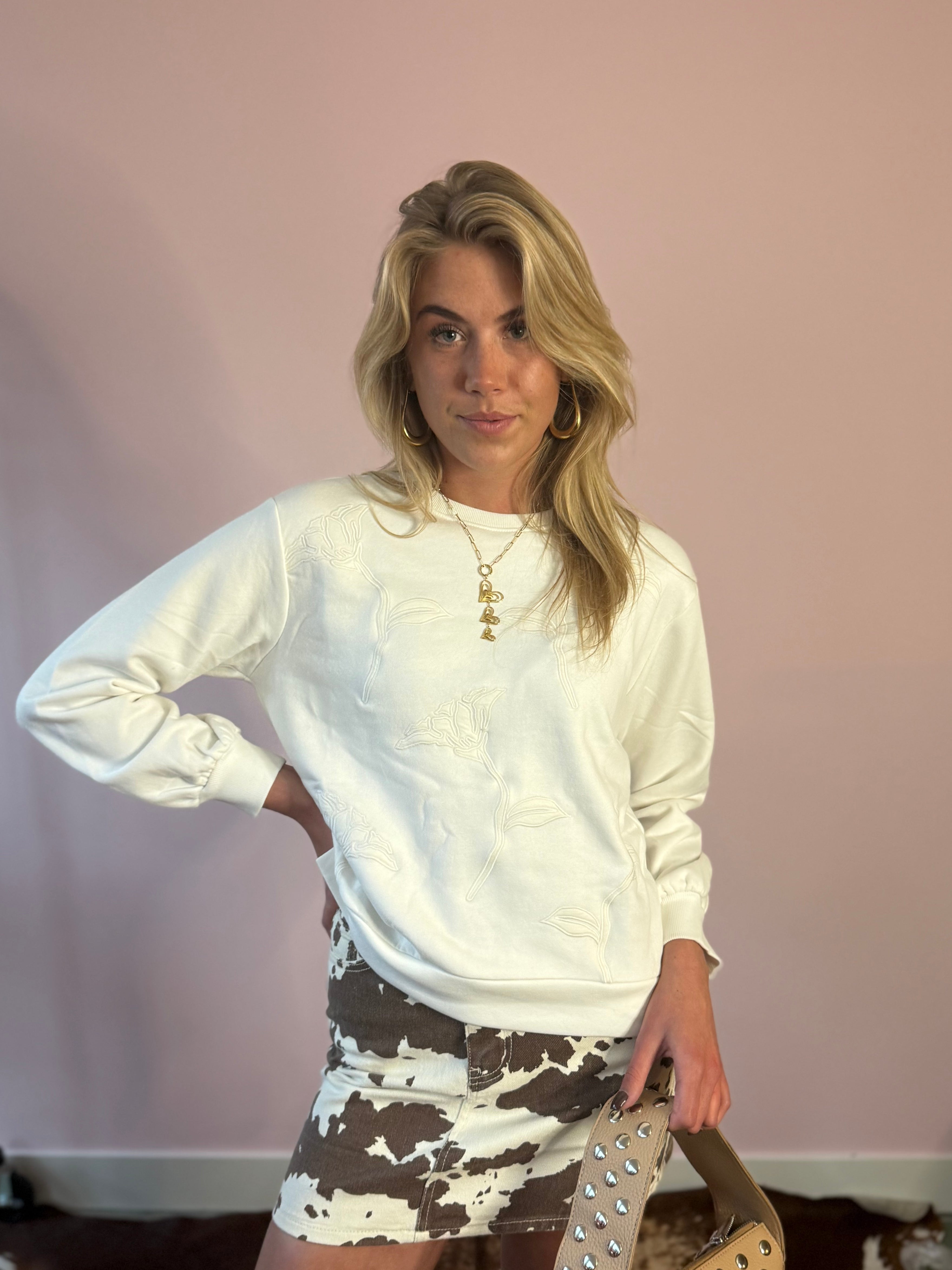 Witte sweaters met rozen